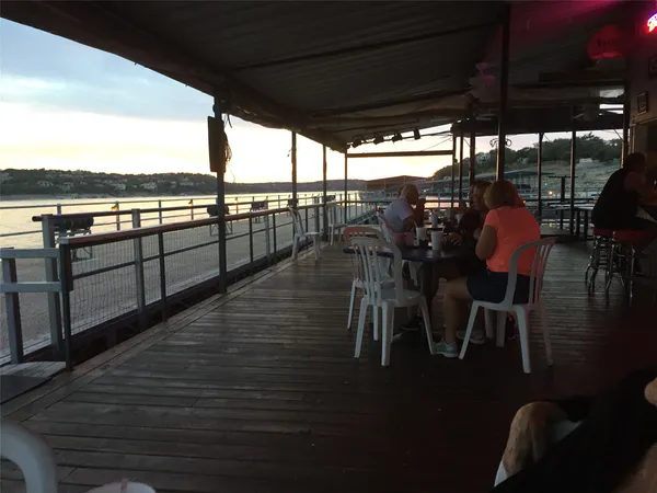 a view of a balcony with an ocean view