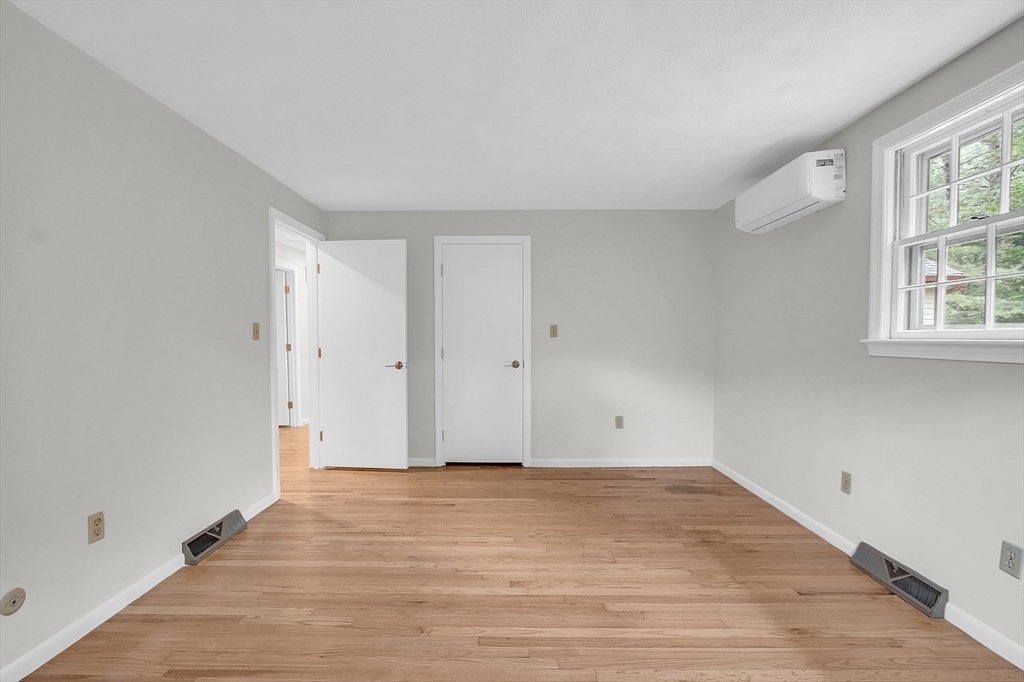 67 Hall Road Chelmsford, MA 01824 - Photo 16 of 35 wooden floor in an empty room