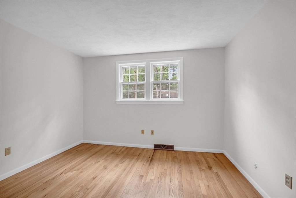 67 Hall Road Chelmsford, MA 01824 - Photo 21 of 35 an empty room with a window