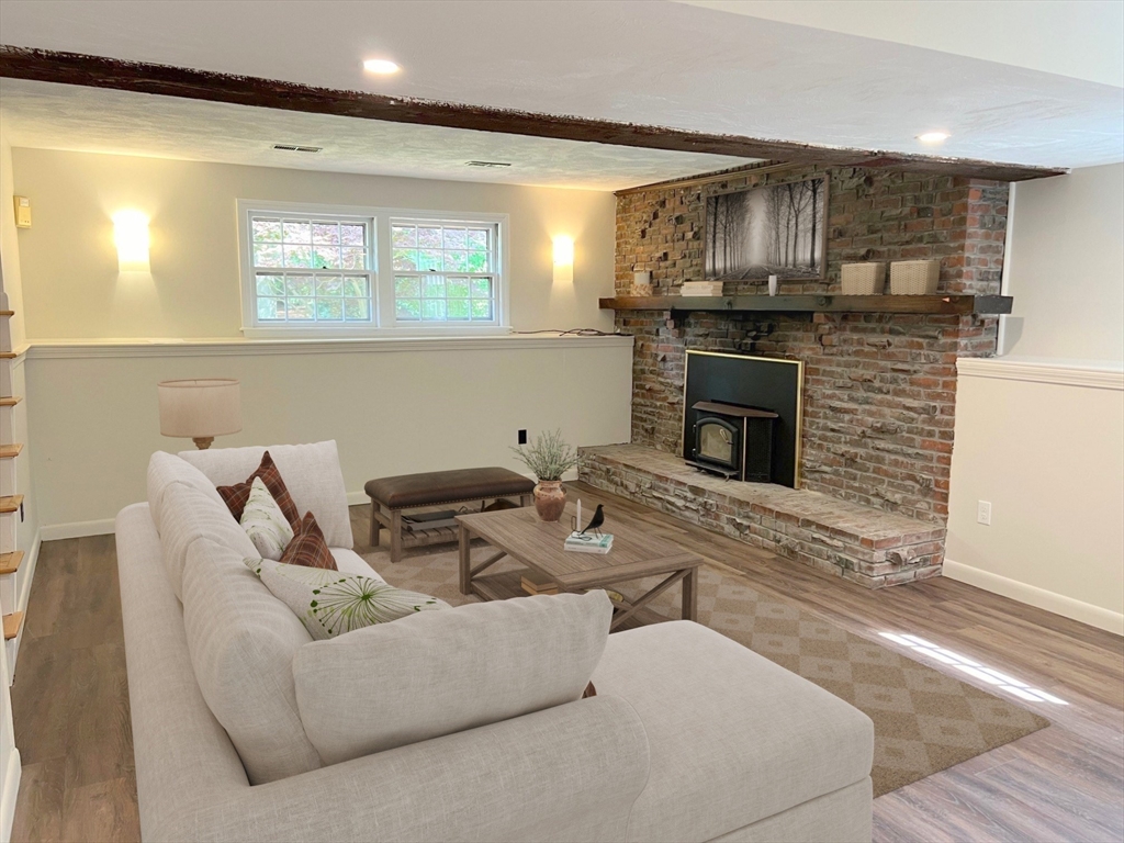 67 Hall Road Chelmsford, MA 01824 - Photo 23 of 35 a living room with furniture and kitchen view