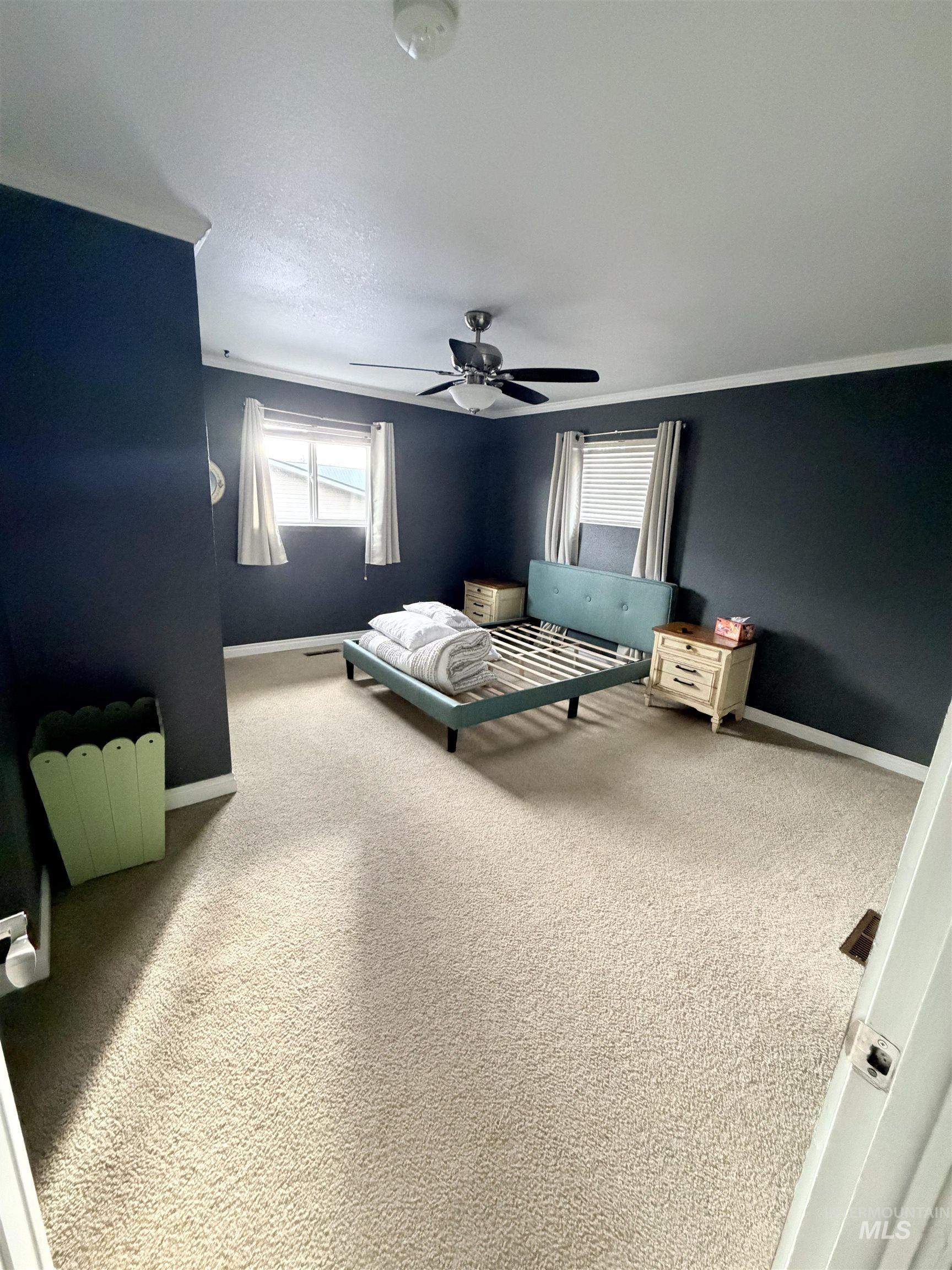 1306 Hemlock Avenue Lewiston, ID 83501 - Photo 15 of 38 Carpeted featuring baseboards and ceiling fan