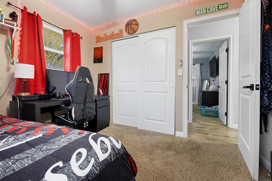 1482 Lee Road Troy, OH 45373 - Photo 14 of 30 This cozy room offers a comfortable retreat with soft carpeting and ample natural light.
