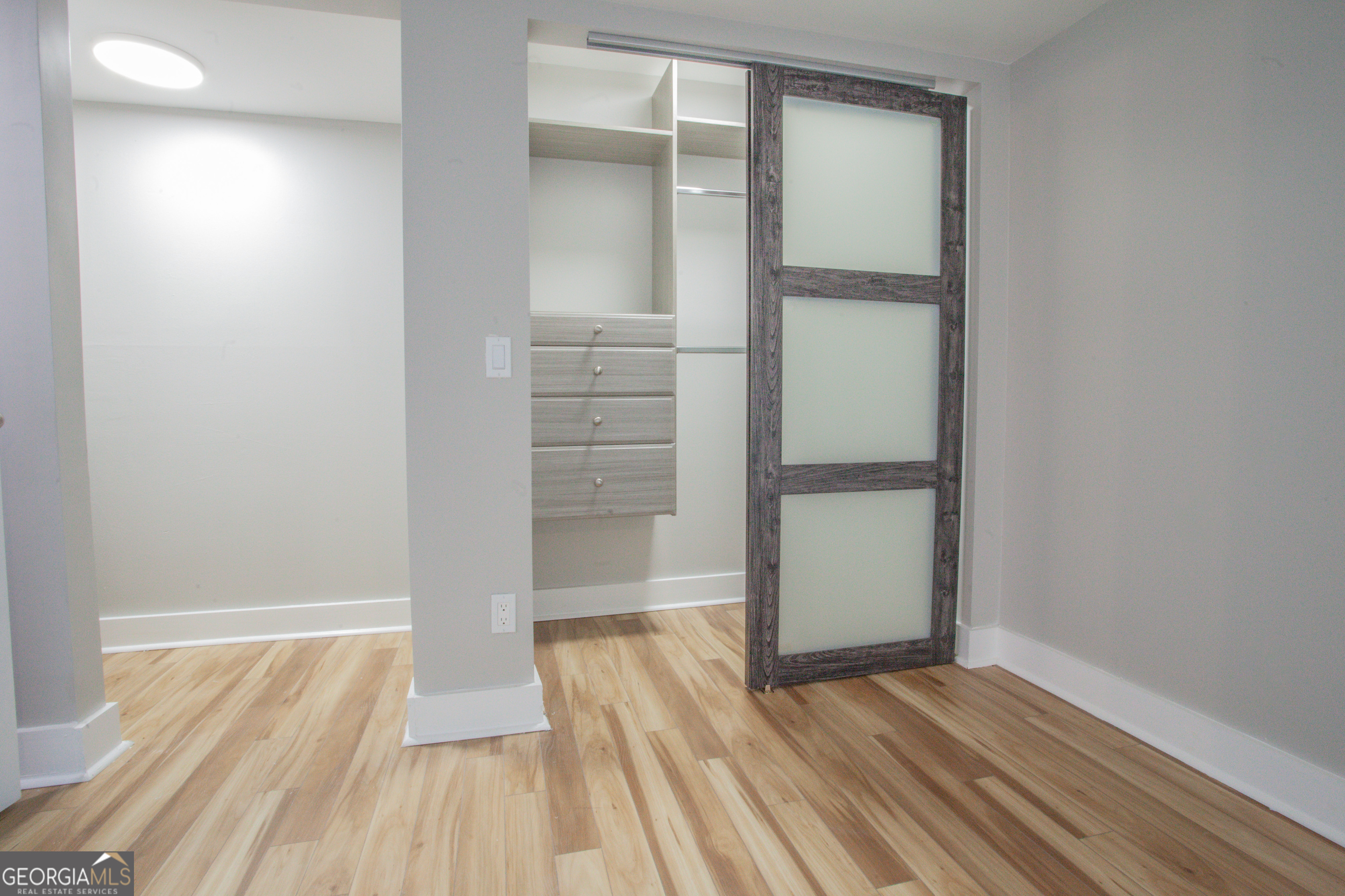 295 Clearview Court Villa Rica, GA 30180 - Photo 15 of 49 a view of empty room with wooden floor