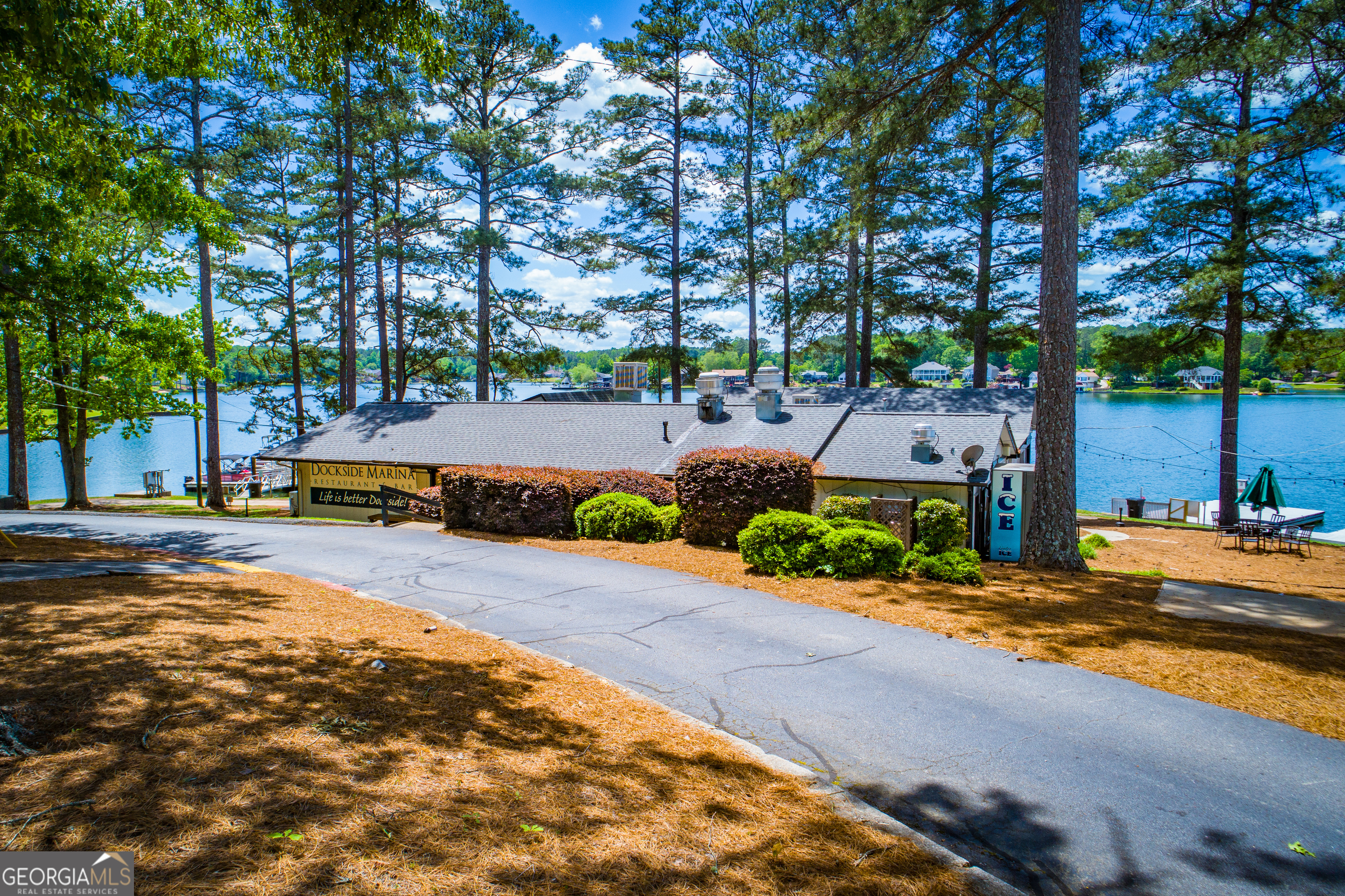 295 Clearview Court Villa Rica, GA 30180 - Photo 31 of 49 a tall yellow house with trees in front of it