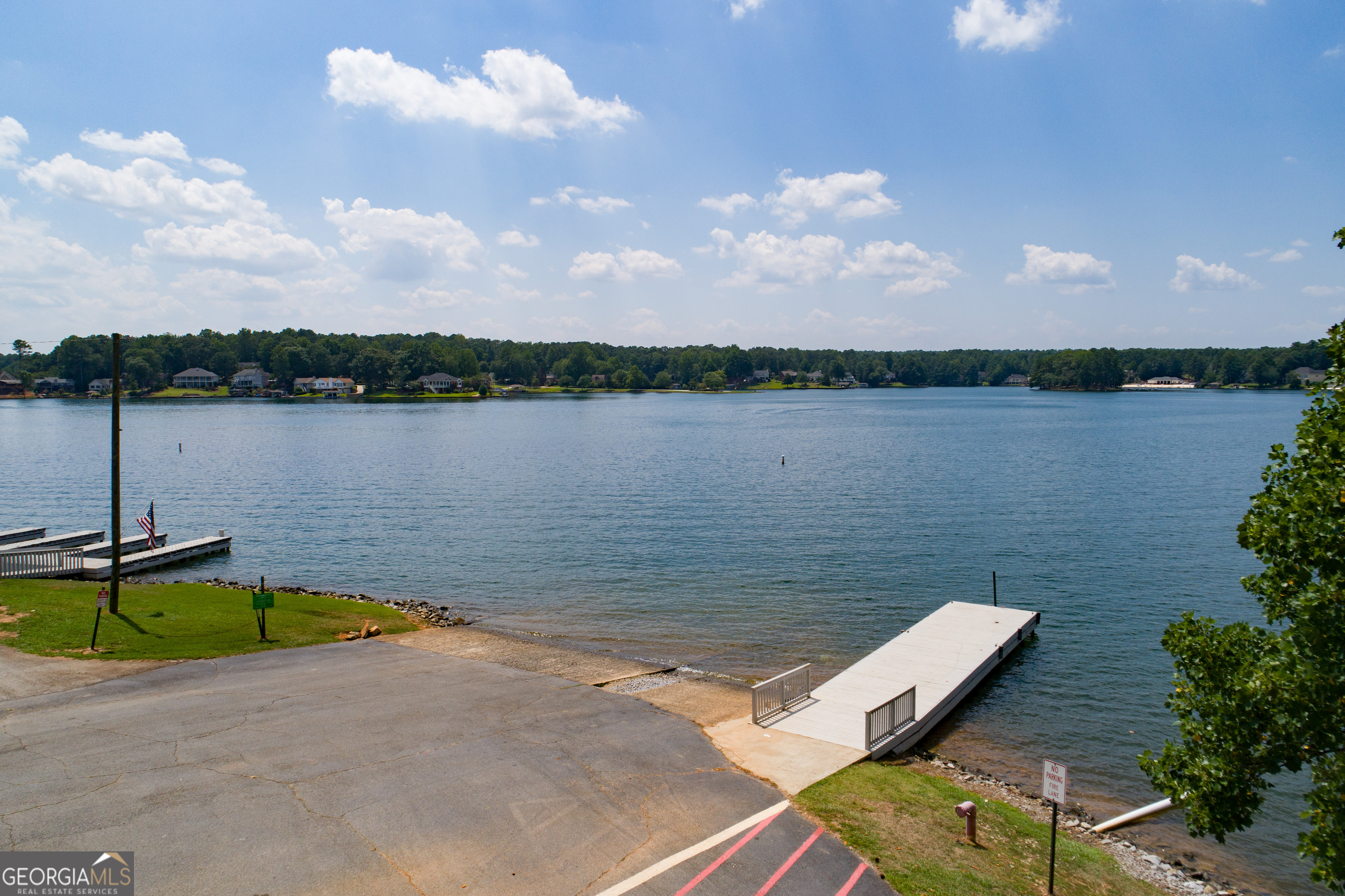 295 Clearview Court Villa Rica, GA 30180 - Photo 43 of 49 a view of a lake with a terrace