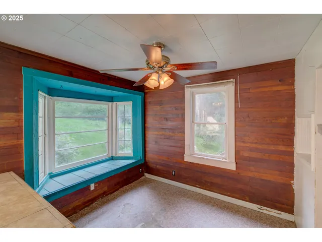 a room with furniture and a window