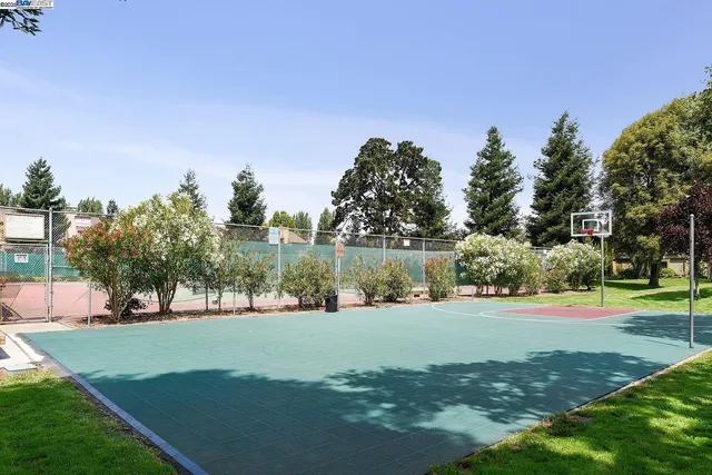 a view of a golf course with a lake