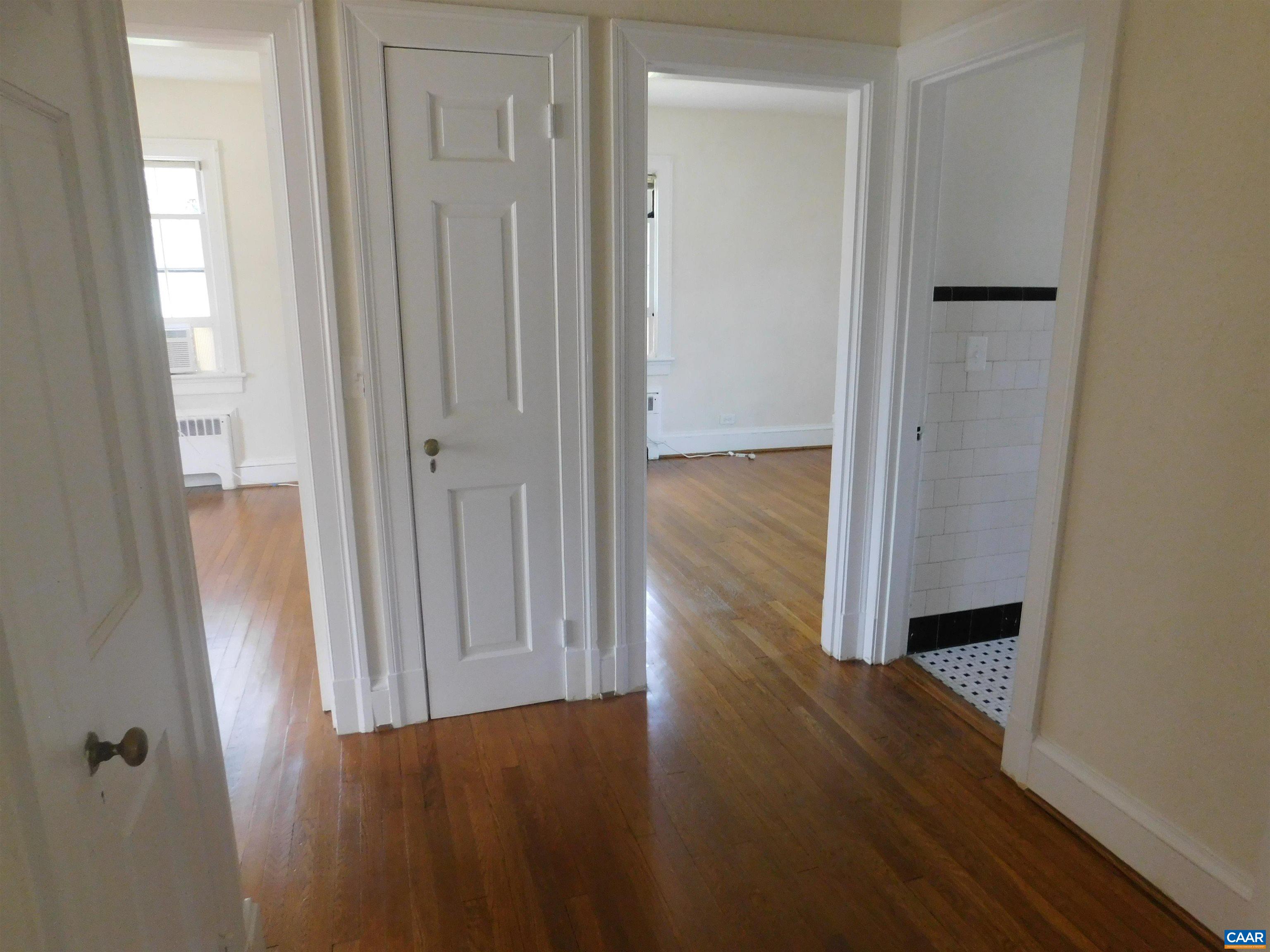 307 Alderman Road Charlottesville, VA 22903 - Photo 14 of 41 a view of a hallway with wooden floor