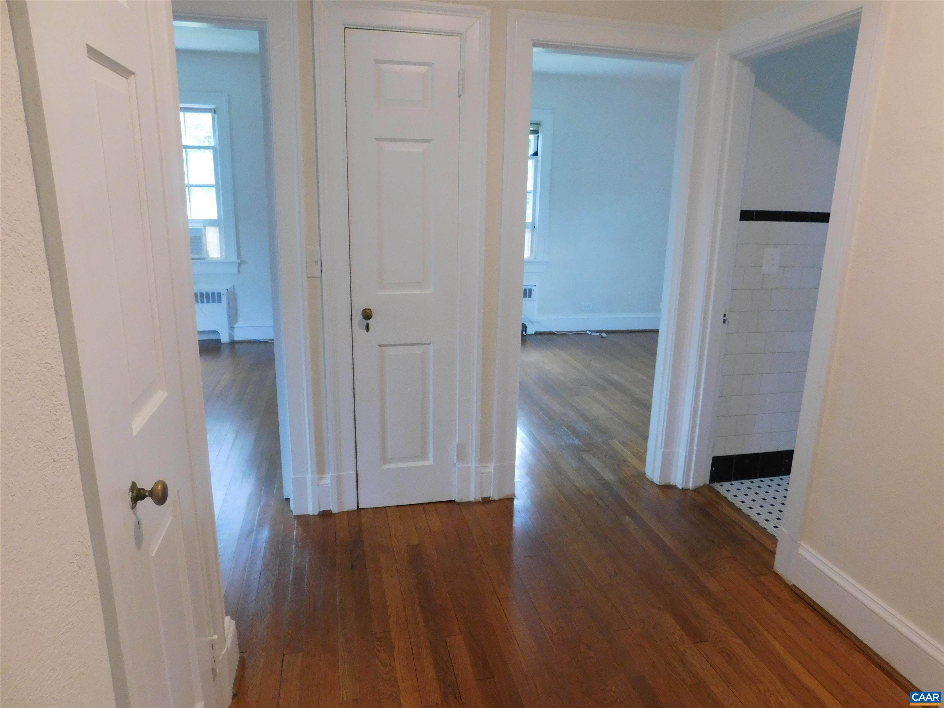 307 Alderman Road Charlottesville, VA 22903 - Photo 17 of 41 a view of a hallway with wooden floor
