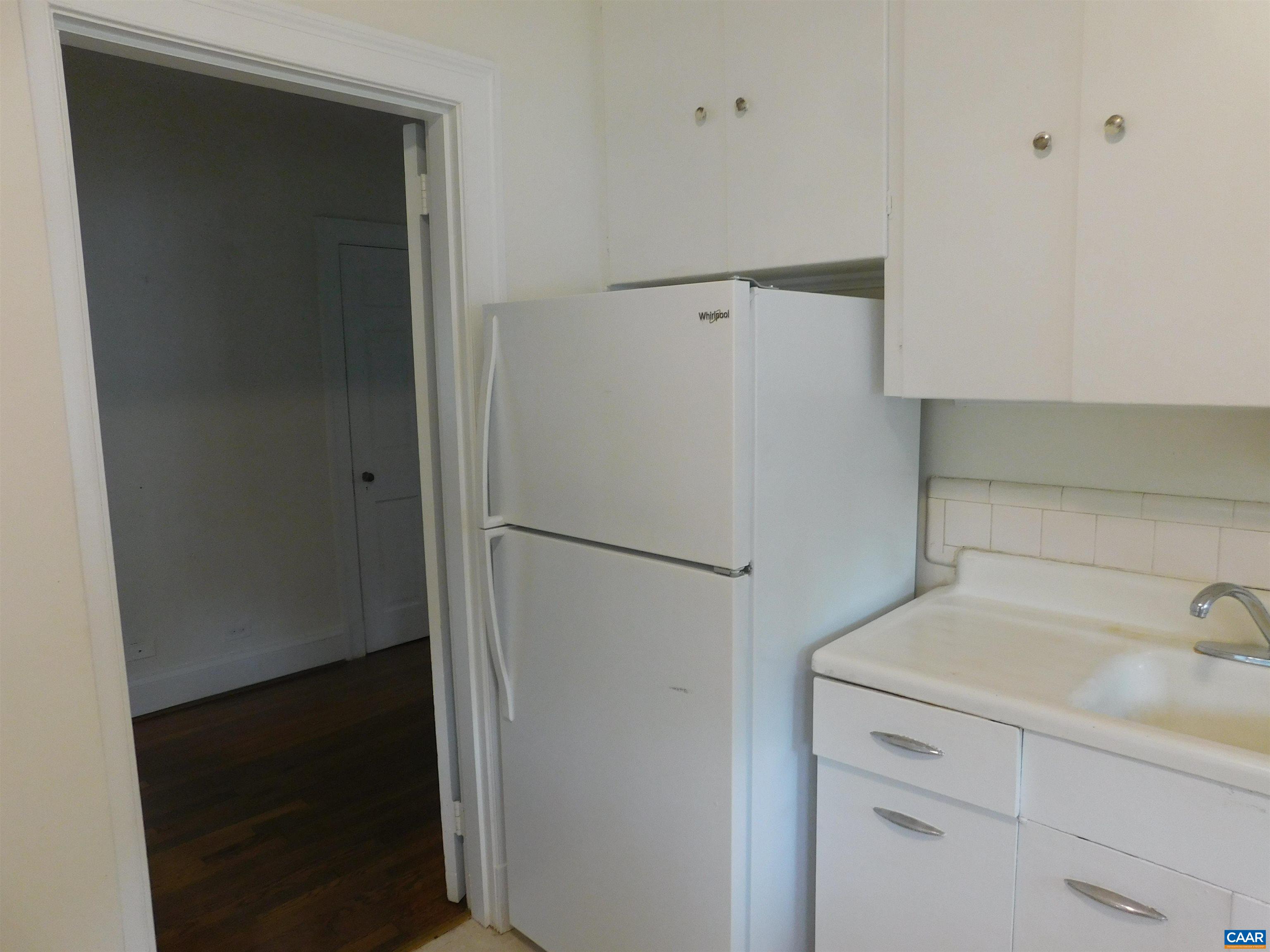307 Alderman Road Charlottesville, VA 22903 - Photo 22 of 41 a white refrigerator freezer sitting inside of a kitchen