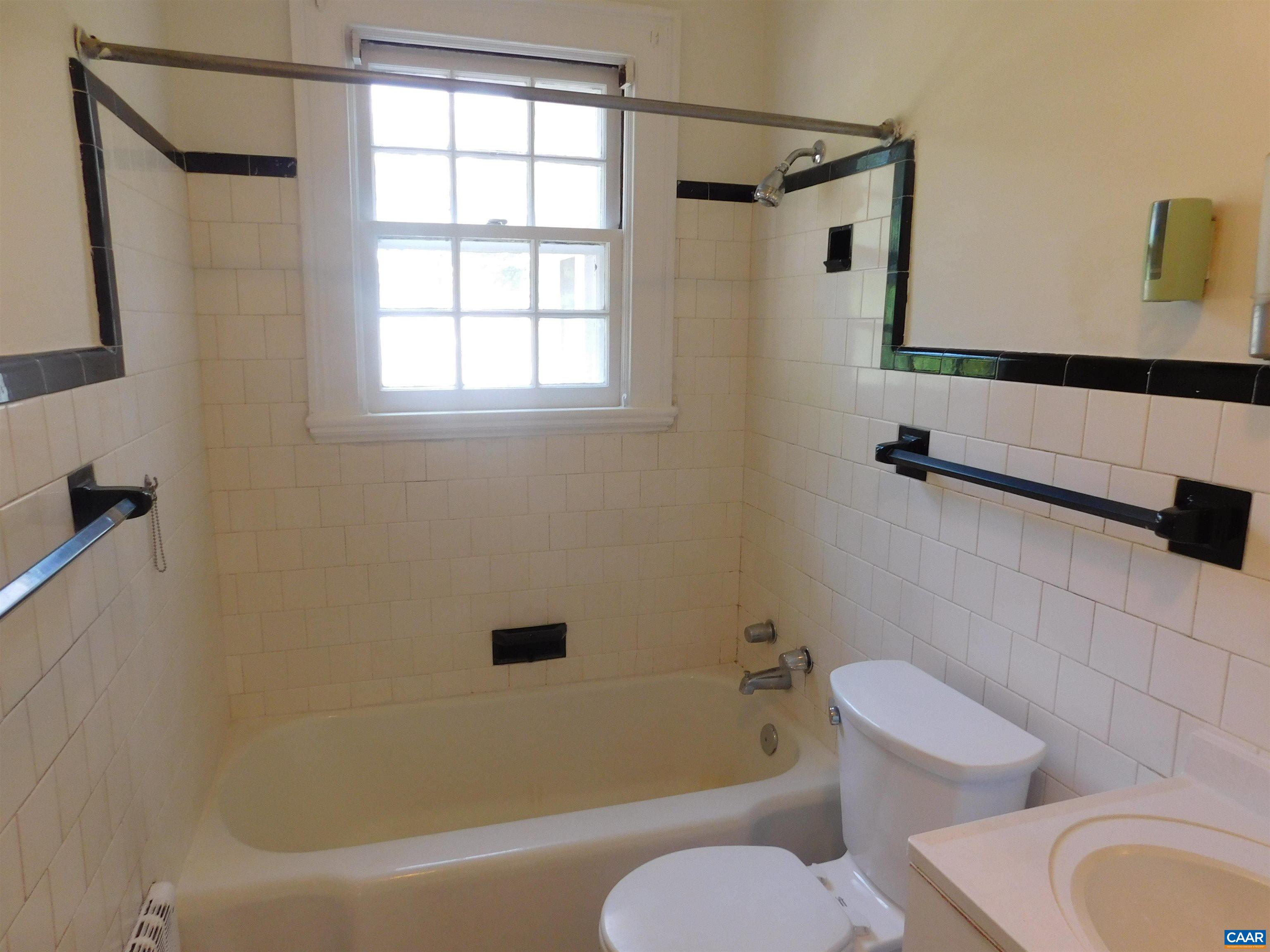 307 Alderman Road Charlottesville, VA 22903 - Photo 23 of 41 a bathroom with a granite countertop bathtub toilet and sink