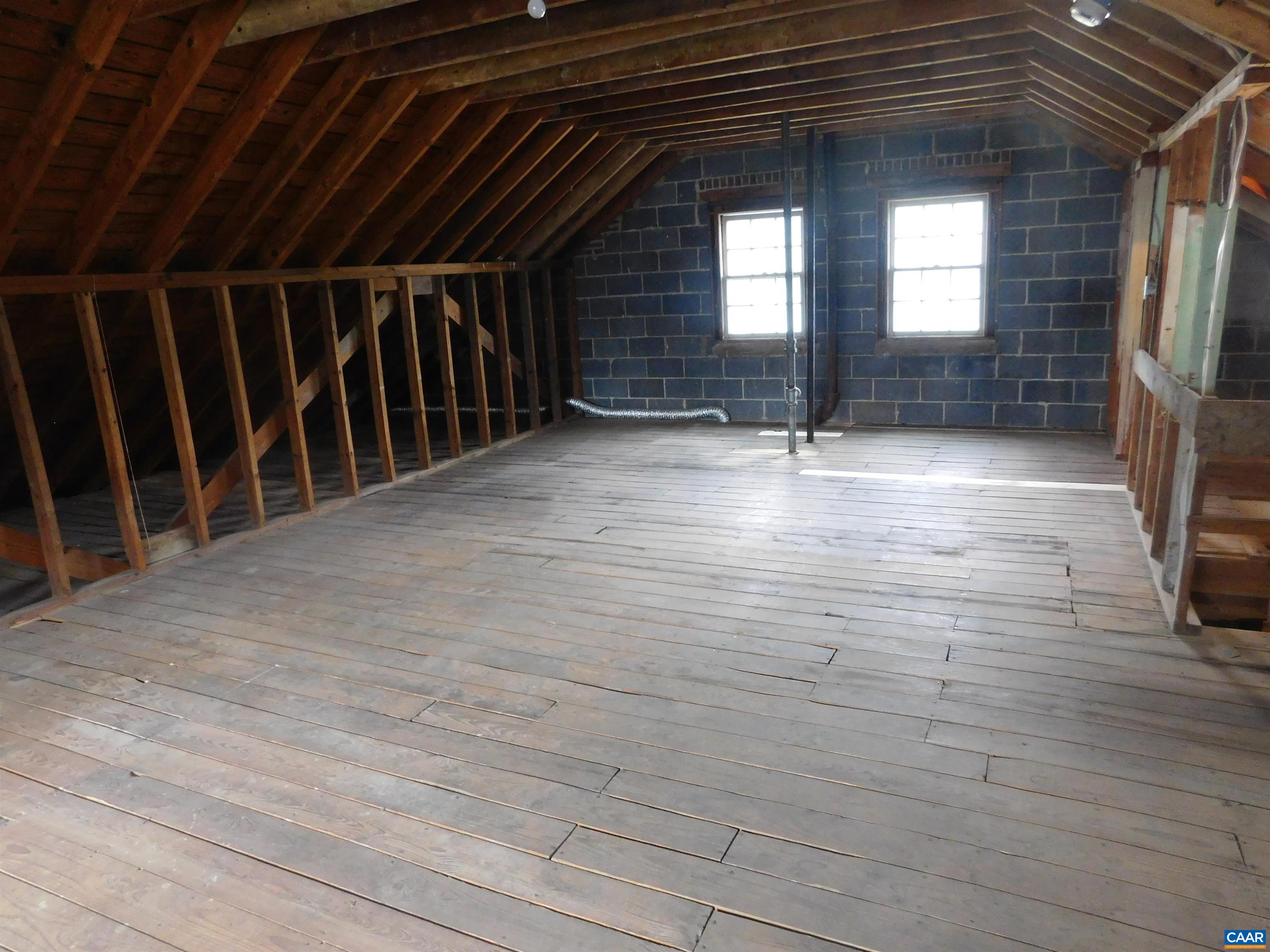 307 Alderman Road Charlottesville, VA 22903 - Photo 25 of 41 a view of empty room with wooden floor and fan