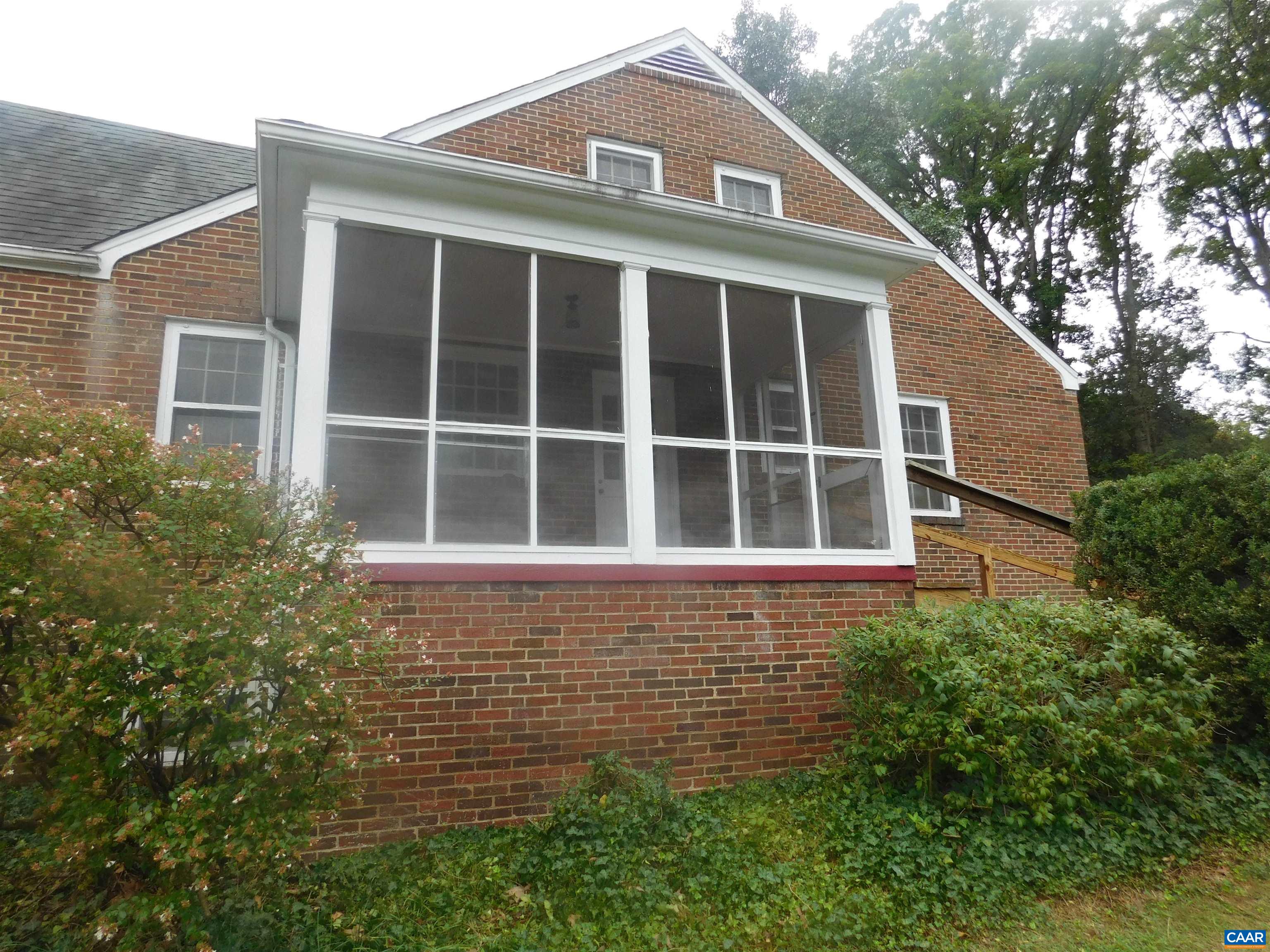 307 Alderman Road Charlottesville, VA 22903 - Photo 5 of 41 a front view of a house with a garden