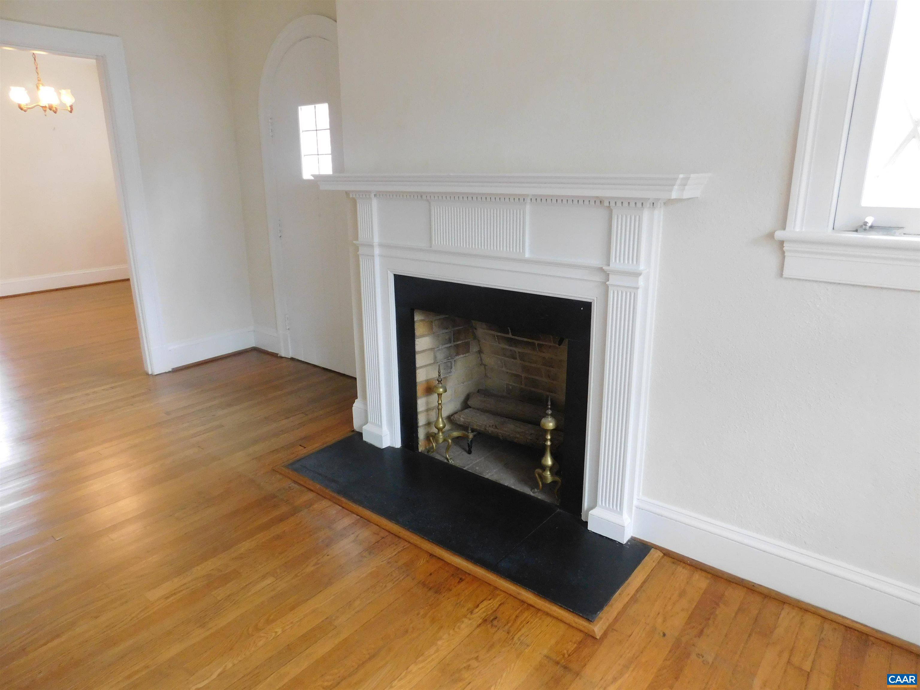 307 Alderman Road Charlottesville, VA 22903 - Photo 9 of 41 a living room with a fireplace