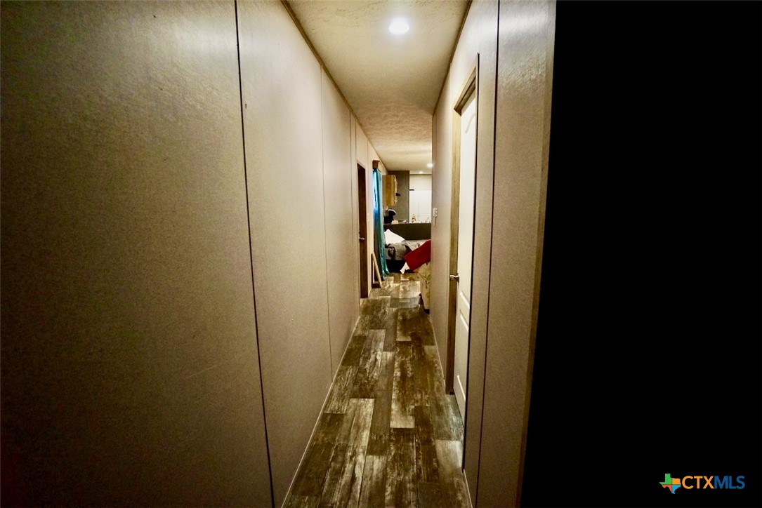 1502 West Monroe Avenue Port O'Connor, TX 77982 - Photo 18 of 22 a view of a hallway