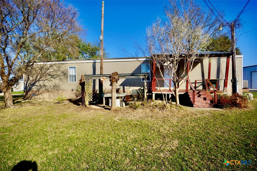 1502 West Monroe Avenue Port O'Connor, TX 77982 - Photo 5 of 22 a view of a house with snow on the side of it