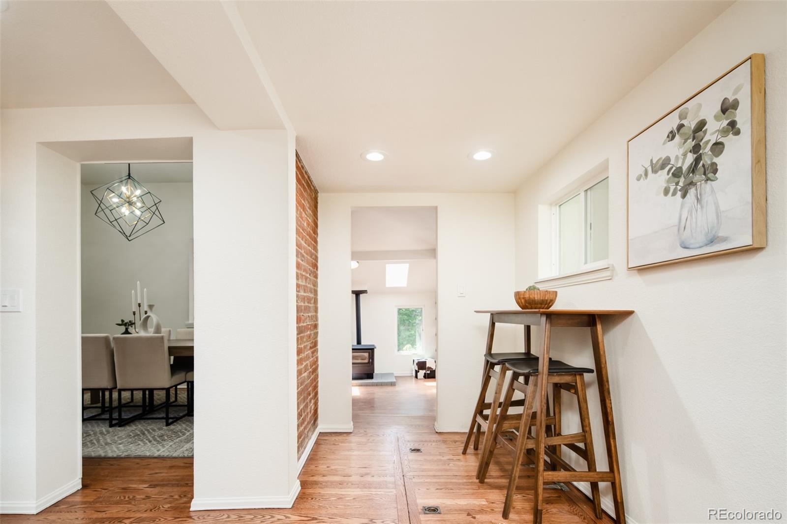 3519 L Newton Street Denver, CO 80211 - Photo 11 of 40 a view of a living room and dining room