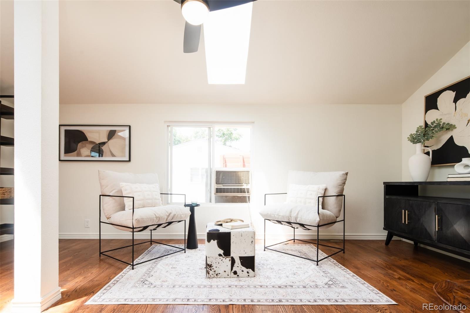 3519 L Newton Street Denver, CO 80211 - Photo 13 of 40 a living room with furniture and a fireplace