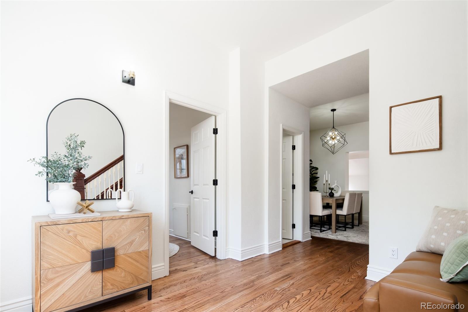 3519 L Newton Street Denver, CO 80211 - Photo 2 of 40 a view of a livingroom with furniture and wooden floor