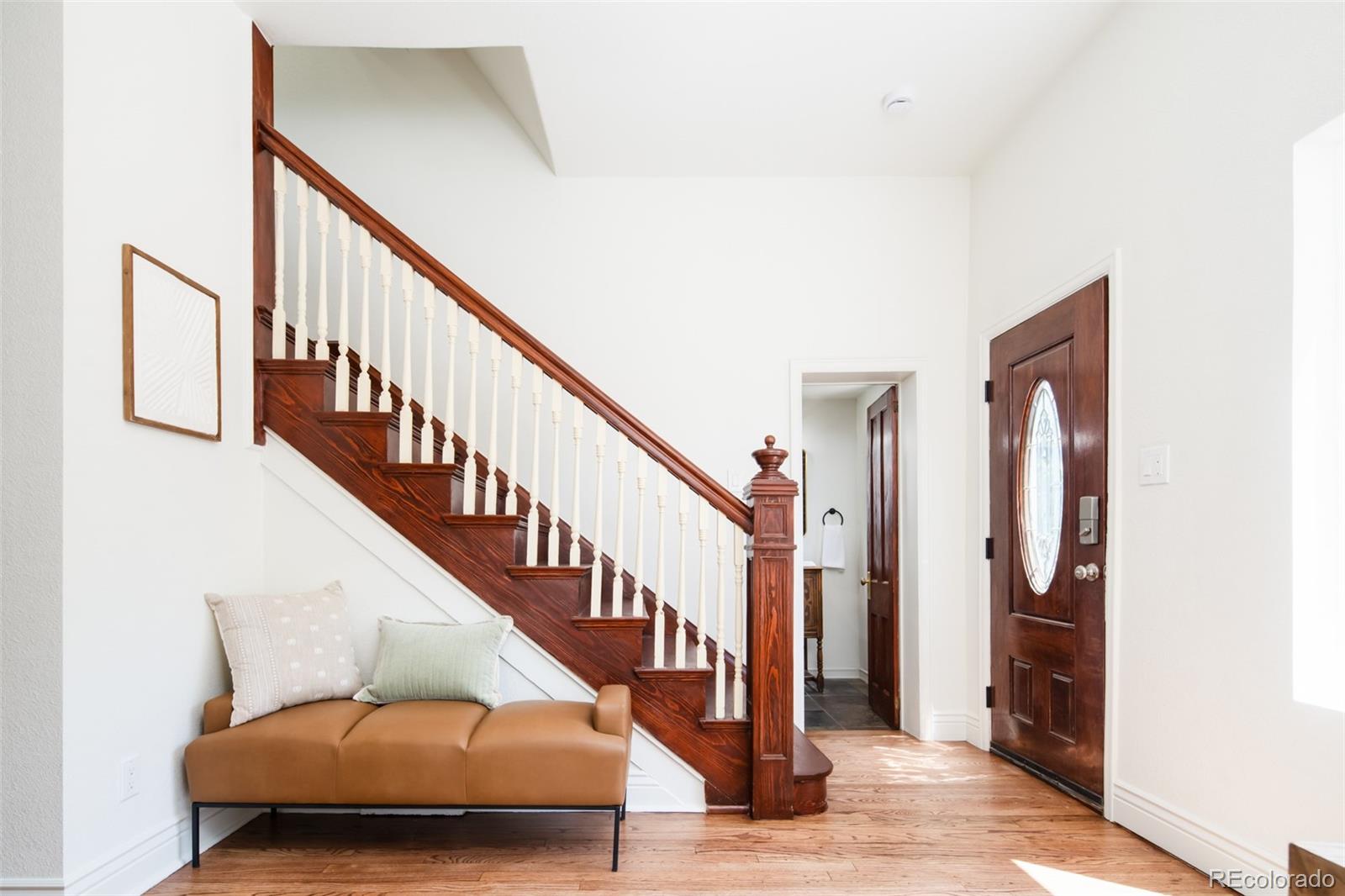 3519 L Newton Street Denver, CO 80211 - Photo 22 of 40 a living room with furniture and stairs
