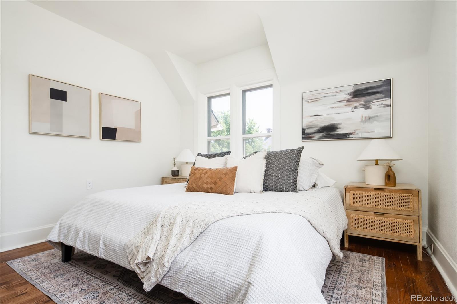 3519 L Newton Street Denver, CO 80211 - Photo 25 of 40 a bedroom with a bed and a couch