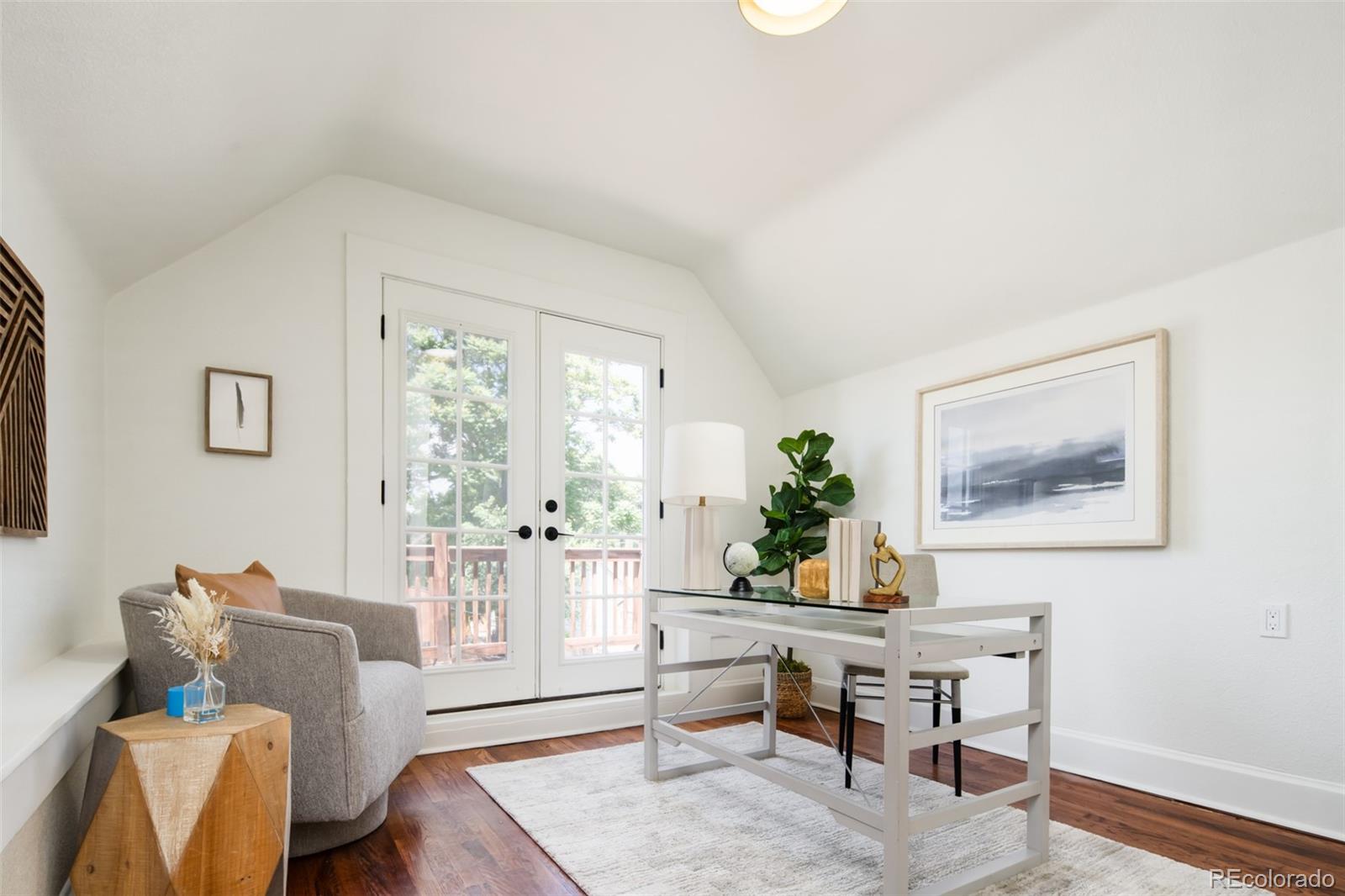 3519 L Newton Street Denver, CO 80211 - Photo 28 of 40 a living room with furniture and a potted plant