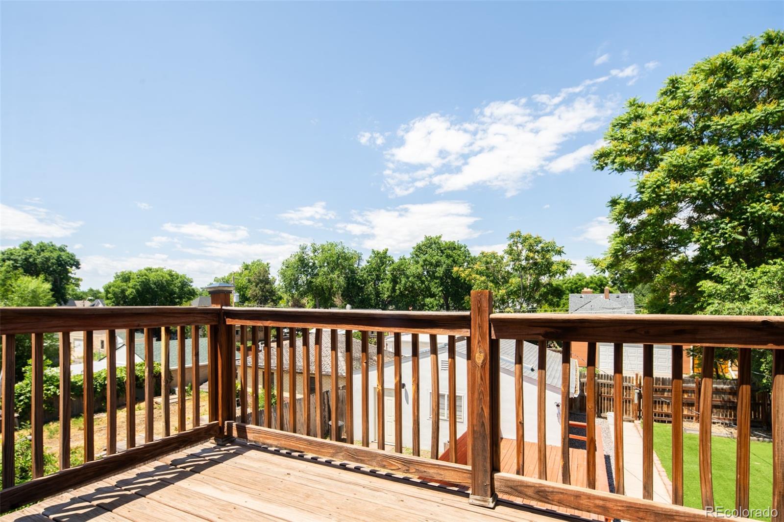 3519 L Newton Street Denver, CO 80211 - Photo 29 of 40 a view of a balcony with wooden floor