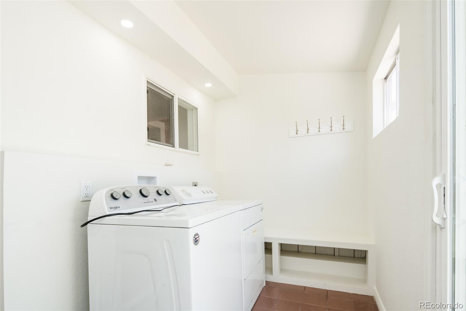 3519 L Newton Street Denver, CO 80211 - Photo 34 of 40 a utility room with dryer and washer