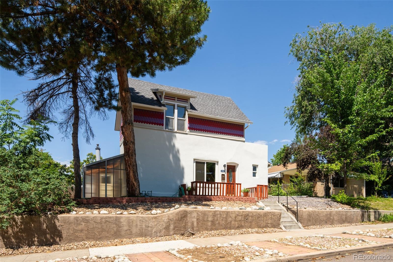 3519 L Newton Street Denver, CO 80211 - Photo 40 of 40 a view of a house with a patio