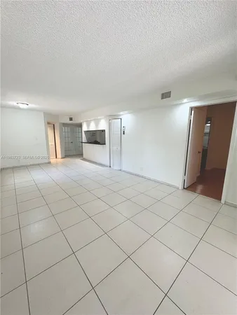 a view of a livingroom with furniture