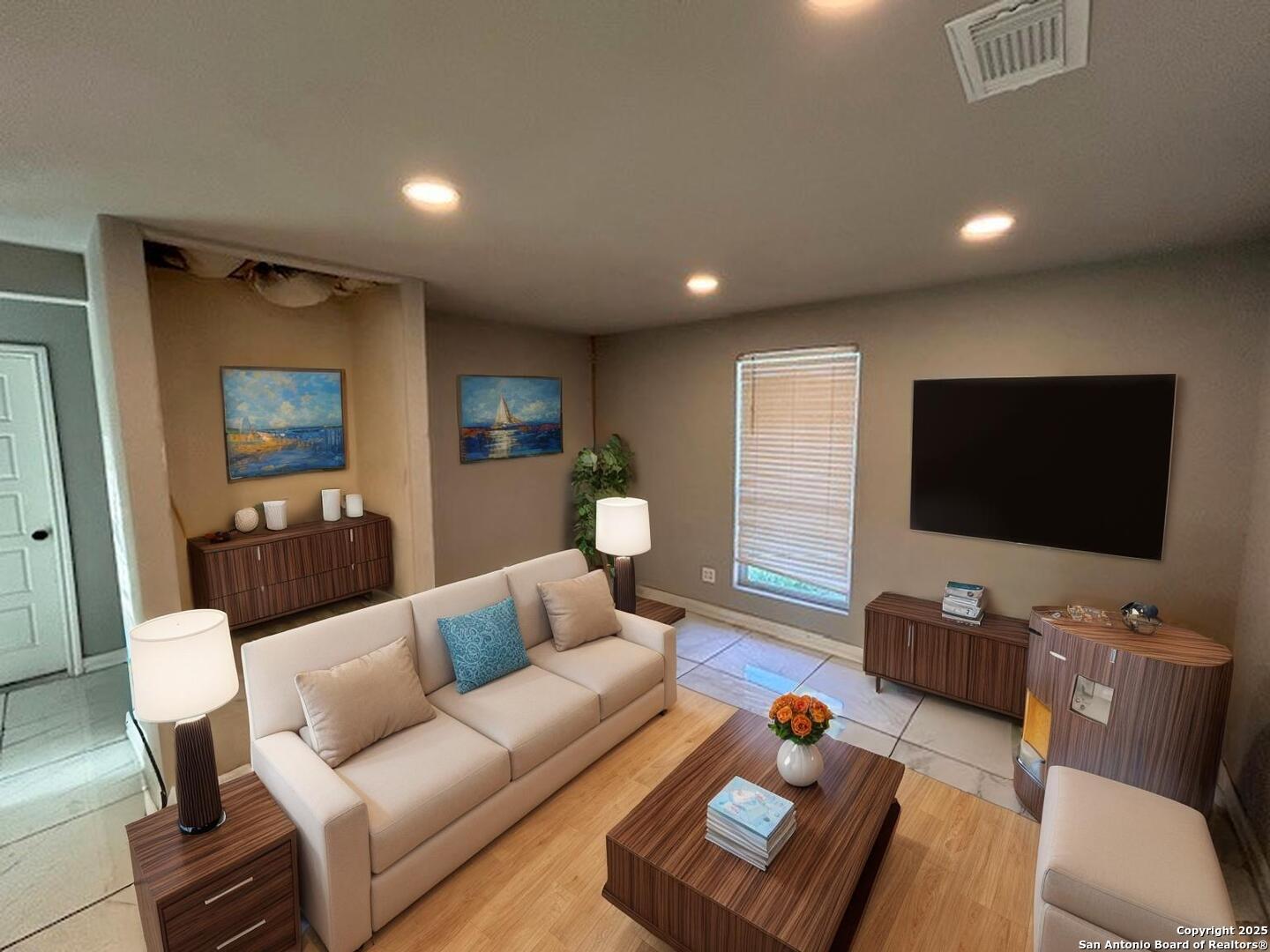 236 Hopi Bandera, TX 78003 - Photo 14 of 34 a living room with furniture and a flat screen tv