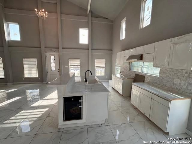 236 Hopi Bandera, TX 78003 - Photo 21 of 34 a open kitchen with stainless steel appliances granite countertop a stove a sink and a refrigerator