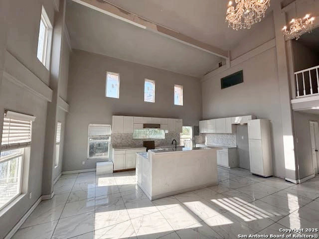 236 Hopi Bandera, TX 78003 - Photo 23 of 34 a kitchen with a sink and refrigerator