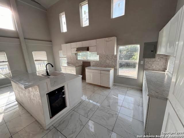 236 Hopi Bandera, TX 78003 - Photo 24 of 34 a kitchen with stainless steel appliances granite countertop a stove a sink and a refrigerator