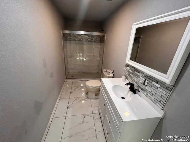 236 Hopi Bandera, TX 78003 - Photo 29 of 34 a bathroom with a sink a toilet and shower
