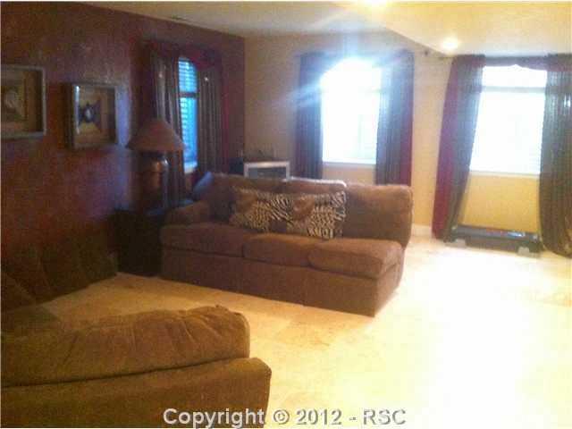 5630 Wilson Road Colorado Springs, CO 80919 - Photo 13 of 16 Basement family room