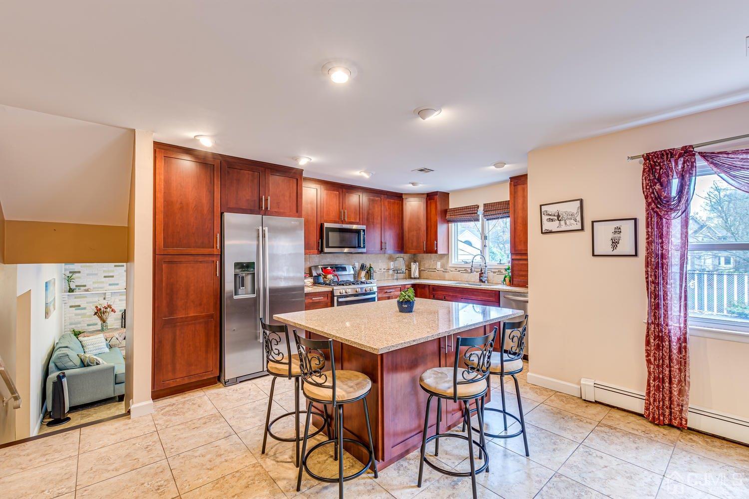983 New Dover Road Edison, NJ 08820 - Photo 8 of 25 a view of a dining room with furniture