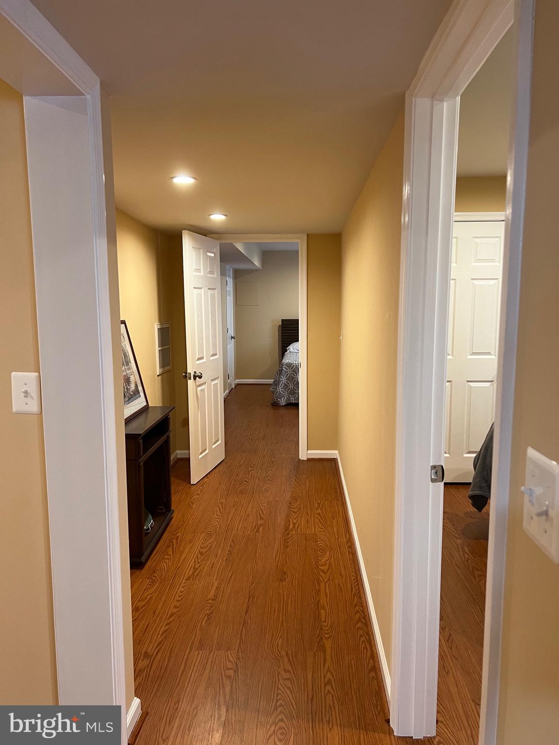 5802 Telluride Lane, Unit BASEMENT APARTMENT Spotsylvania, VA 22553 - Photo 28 of 35 a view of a hallway with wooden floor and staircase