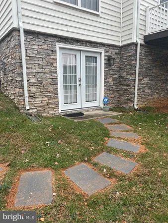 a view of a backyard with a garden