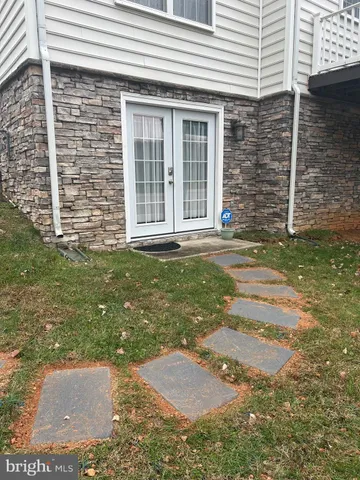 a view of a backyard with a garden