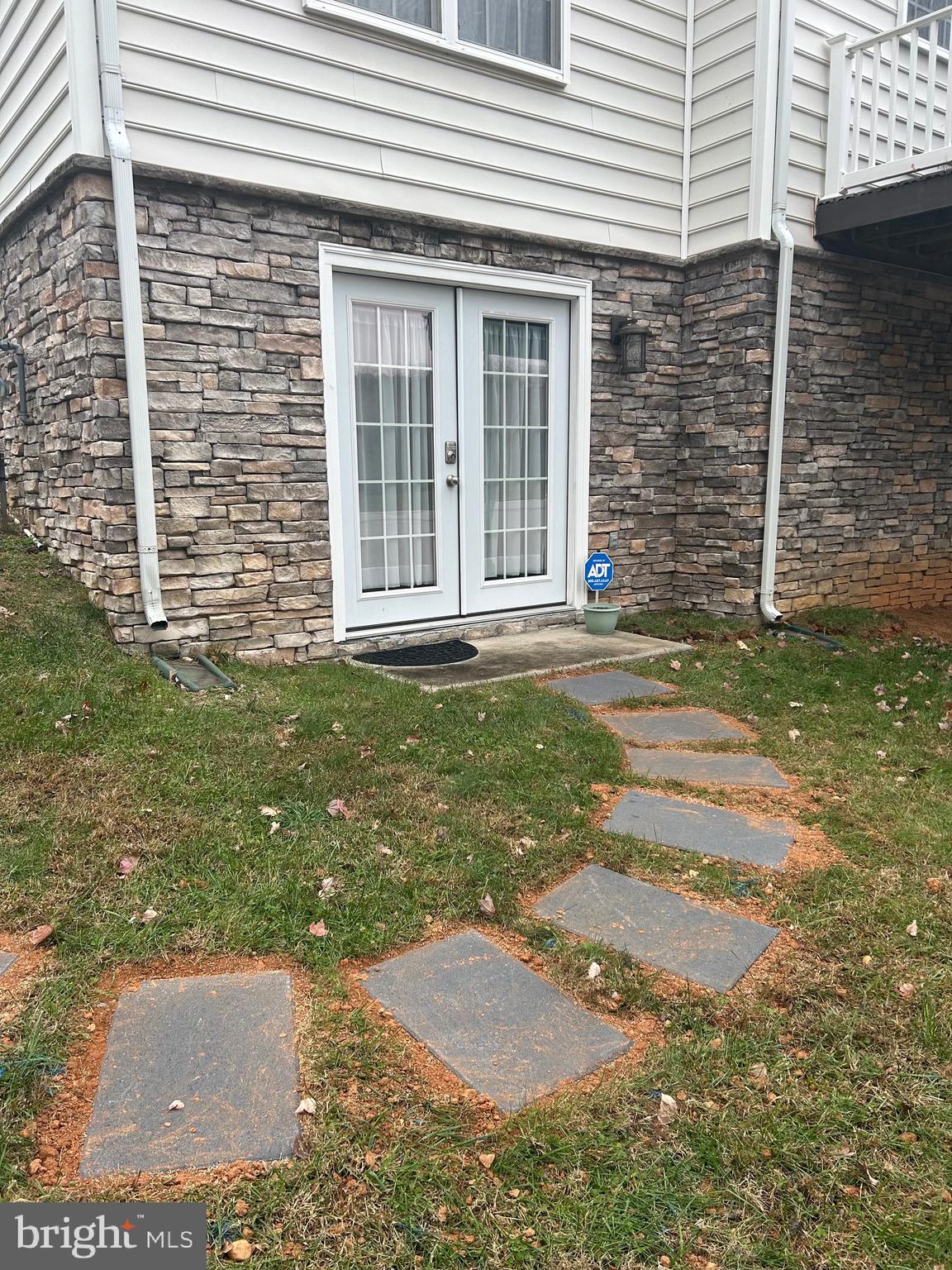 5802 Telluride Lane, Unit BASEMENT APARTMENT Spotsylvania, VA 22553 - Photo 5 of 35 a view of a backyard with a garden