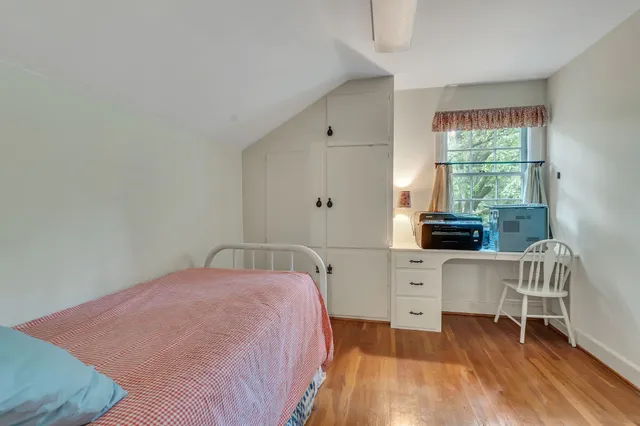 a kitchen with stainless steel appliances a stove a sink and cabinets