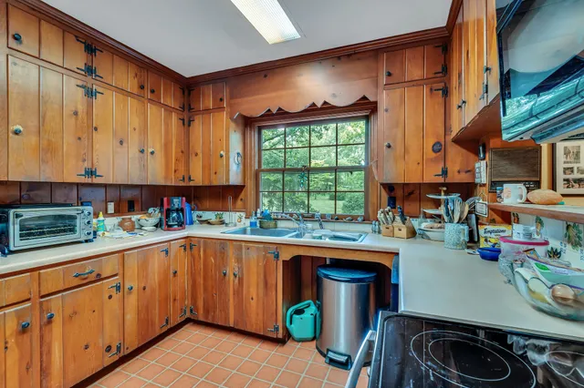 a bathroom with a sink and toilet