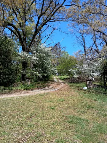 a backyard of a house with seating space