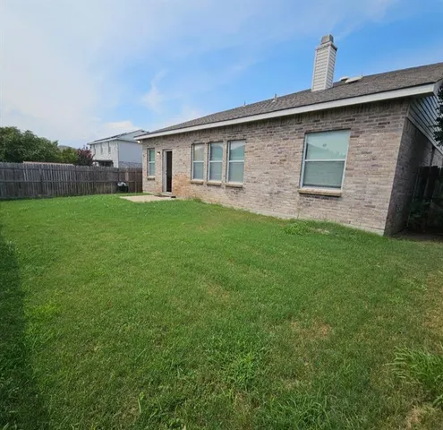 a view of a livingroom with wooden floor