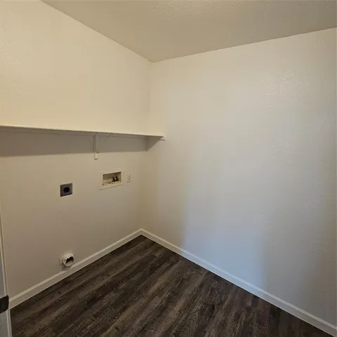 a view of small space with racks on the wall