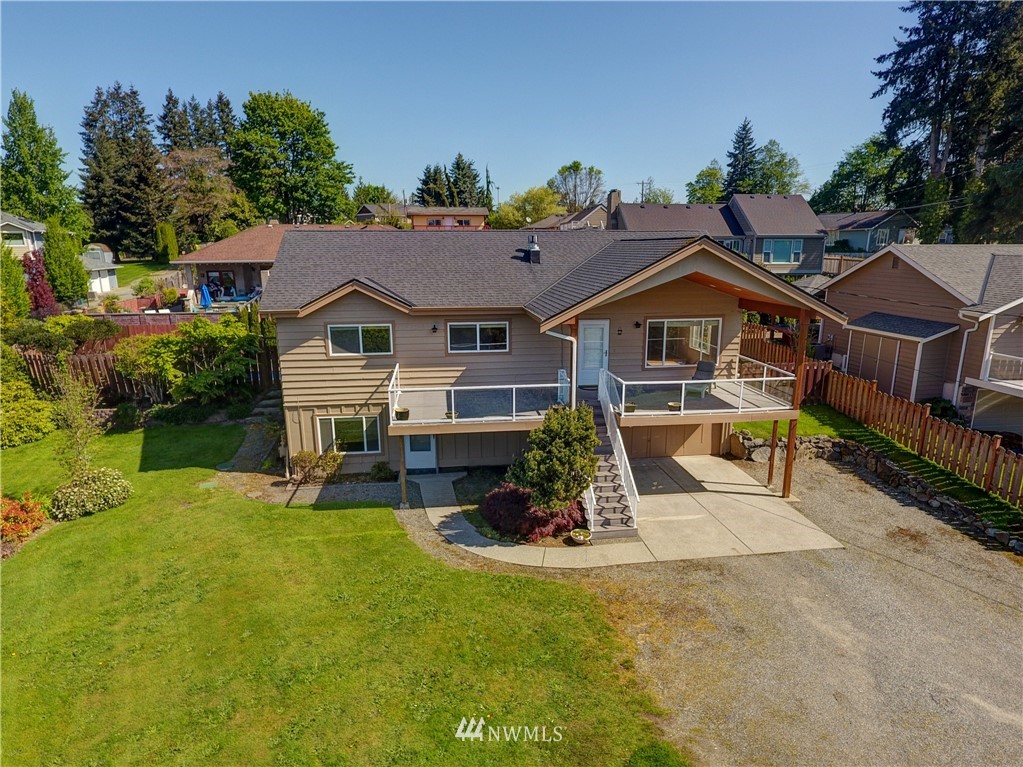 2106 Cedar Road Lake Stevens, WA 98258 - Photo 1 of 24 a front view of a house with garden