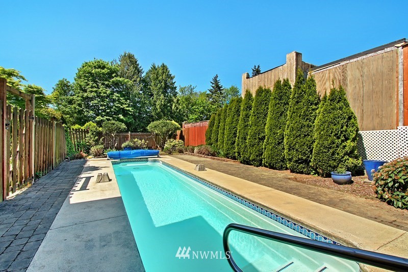 2106 Cedar Road Lake Stevens, WA 98258 - Photo 20 of 24 a view of a swimming pool with a potted plants