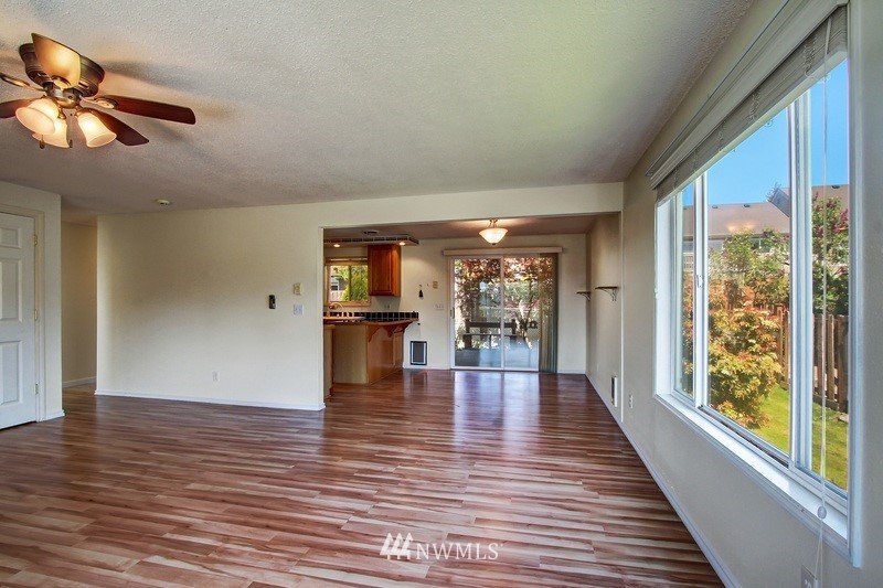 2106 Cedar Road Lake Stevens, WA 98258 - Photo 5 of 24 a view of empty room with wooden floor and fan
