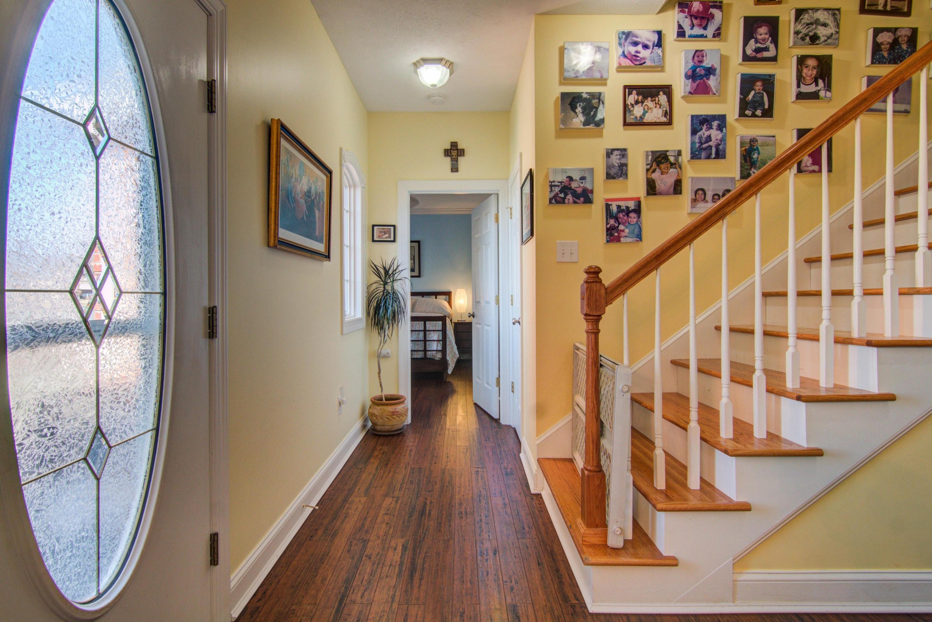 1129 Mountain View Road Vinton, VA 24179 - Photo 2 of 24 a view of entryway with wooden floor and stairs